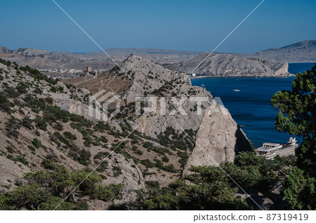 View of the ancient city of Sudak and the Genoese fortress on the Black Sea coast in Crimea 87319419