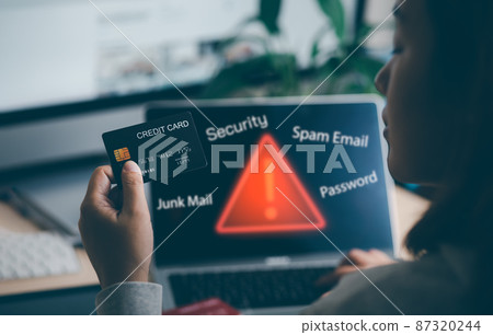 Woman hand hold credit card touch laptop with Security warning in graph Screen code of a media screen on the White background, Technology Process System Business and hacks online concept, Copy space Woman hand hold credit card touch laptop with Security warning in graph Screen code of a media screen on the White background, Technology Process System Business and hacks online concept, Copy space 87320244