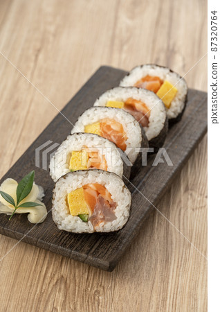 Maki sushi on a plate, seafood roll 87320764