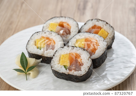 Maki sushi on a plate, seafood roll 87320767