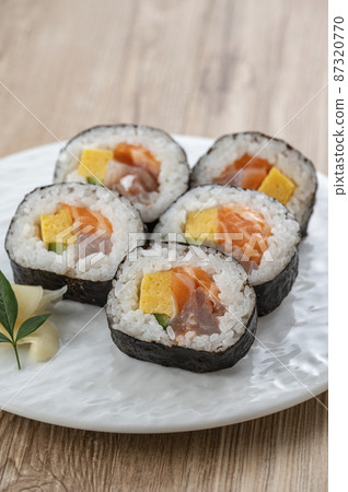 Maki sushi on a plate, seafood roll 87320770