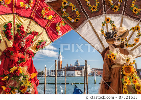 Colorful carnival masks at a traditional festival in Venice, Italy Colorful carnival masks at a traditional festival in Venice, Italy 87321613