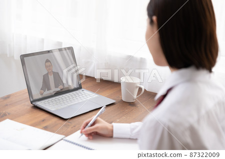 High school girls taking remote lessons 87322009