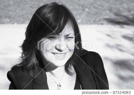 Mature woman in positive attitude Mature woman in positive attitude 87324063