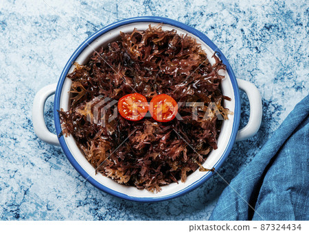 some cooked irish moss in a white saucepan some cooked irish moss in a white saucepan 87324434