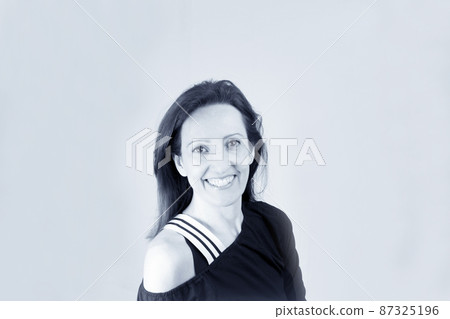 Forty year old woman with happy, joyful and positive expression 87325196