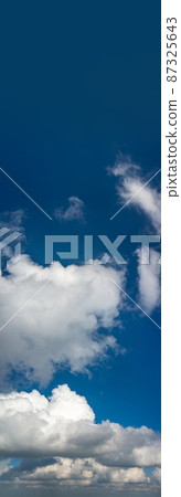 Fantastic clouds against blue sky, panorama 87325643
