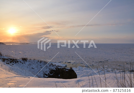 Sunset and drift ice at Notoro Misaki Hokkaido 87325816