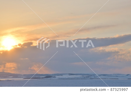 Sunset and drift ice at Notoro Misaki Hokkaido 87325997