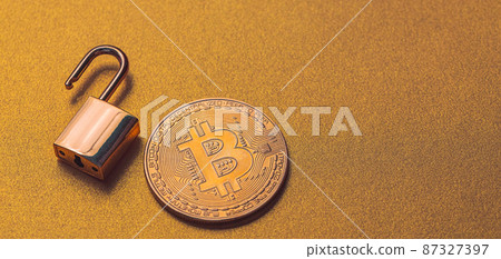 Unlock bitcoin, background with bitcoin and lock Unlock bitcoin, background with bitcoin and lock 87327397