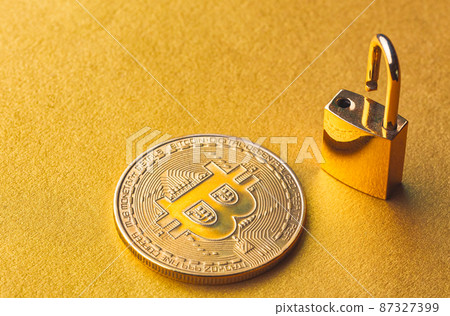 Unlock bitcoin, background with bitcoin and lock Unlock bitcoin, background with bitcoin and lock 87327399