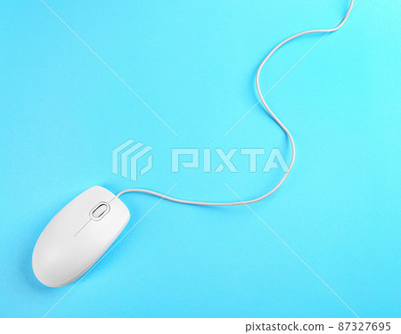 Modern wired mouse on light blue background, top view Modern wired mouse on light blue background, top view 87327695