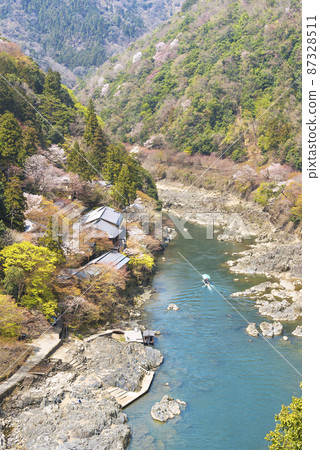 Hozu River and Arashiyama in spring seen from Arashiyama Park Observatory 87328511