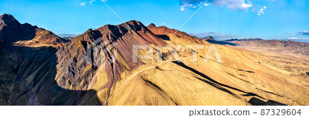 Pallay Punchu of Apu Takllo Rainbow Mountains in Peru 87329604