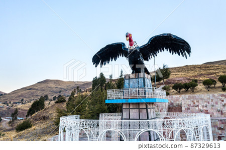 Condor statue at a lookout over Puno in Peru 87329613