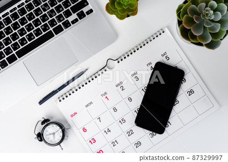 Calendar page close up on office desk Calendar page close up on office desk 87329997