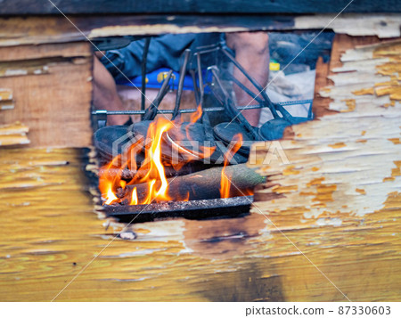 Close up shot of man grilling  food 87330603