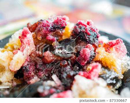 Close up shot of shaved ice with brown sugar sauce Close up shot of shaved ice with brown sugar sauce 87330667