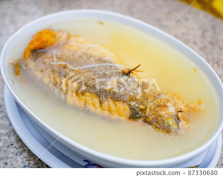 Close up shot of fish soup 87330680