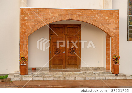 Wooden door of the church 87331765