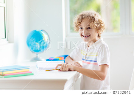 Online remote learning. School kids with computer. 87332941