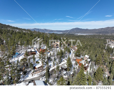 Aerial view over Big Bear Lake Village with snow, South California, USA 87333291