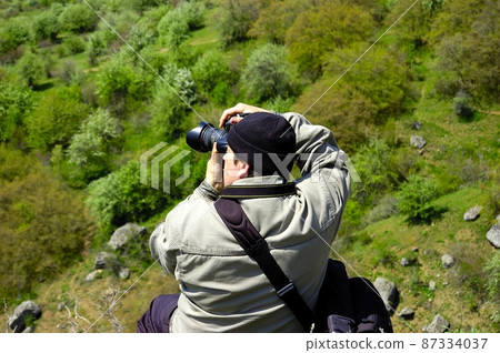 Photographer take a nature photography 87334037