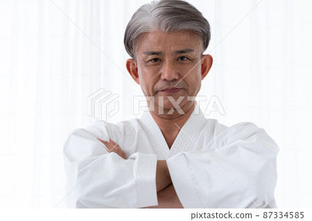 Middle-aged male martial artist wearing a dogi 87334585