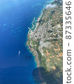 The shadow of Miyakojima, the ship, and the plane reflected in the sky 87335646