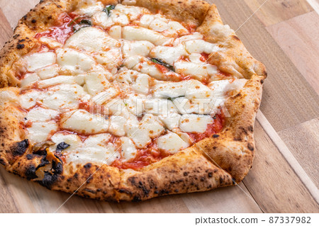 Freshly baked pizza pizza 87337982