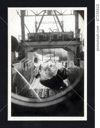History of whaling, 1939, a rare photo of whales being dismantled on a prewar whaling ship. 87338928