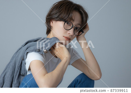 A woman with short hair A woman with short hair 87339911