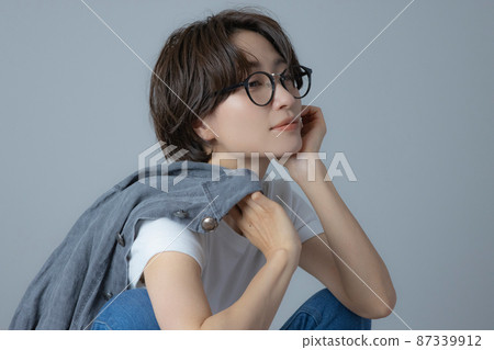 A woman with short hair A woman with short hair 87339912