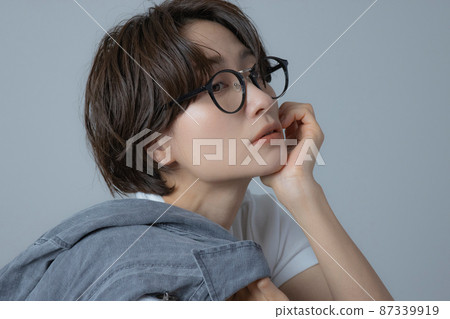 A woman with short hair A woman with short hair 87339919