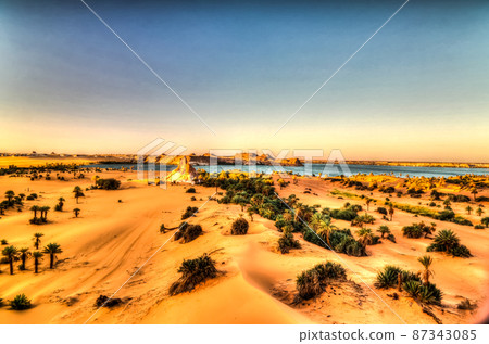 Aerial sunrise Panoramic view to Yoa lake group of Ounianga kebir lakes at the Ennedi, Chad Aerial sunrise Panoramic view to Yoa lake group of Ounianga kebir lakes at the Ennedi, Chad 87343085