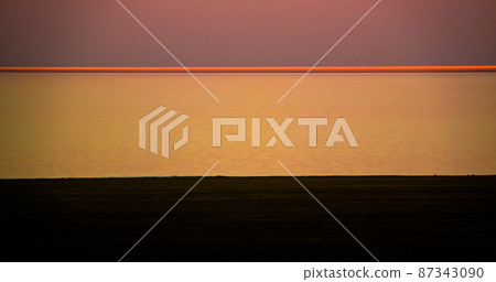 Panorama view to Aral sea from the rim of Plateau Ustyurt near A 87343090