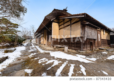 Tome-cho samurai residence in the snowy landscape of Meiji-mura in Miyagi 87343410