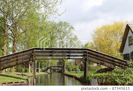 Beautiful wooden bridge of heat horn seen from a sightseeing boat 87345615