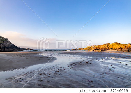 The beautiful Cloughglass bay and beach by Burtonport in County Donegal - Ireland The beautiful Cloughglass bay and beach by Burtonport in County Donegal - Ireland 87346019