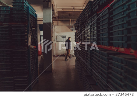 Gold mining storage rock core samples geology drilling industy. Large ore warehouse in modern industry, ores stacked in boxes. Selective focus  87346478
