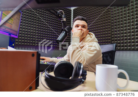 puzzled professional radio host broadcasts live reads news  87348776