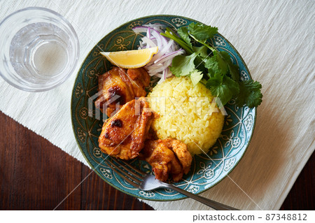Tandoori chicken and saffron rice Tandoori chicken and saffron rice 87348812