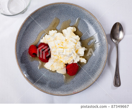 Mato with honey and strawberry - traditional catalan dessert closeup Mato with honey and strawberry - traditional catalan dessert closeup 87349667