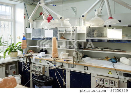 Workplace of contemporary prosthetic manufactory worker Workplace of contemporary prosthetic manufactory worker 87350859