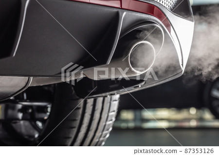 Leaking gases from the exhaust of a petrol or diesel car 87353126