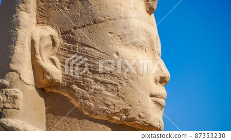 Luxor Temple in Luxor, ancient Thebes, Egypt. Luxor Temple is a large Ancient Egyptian temple complex located on the east bank of the Nile River and was constructed approximately 1400 BCE. 87353230
