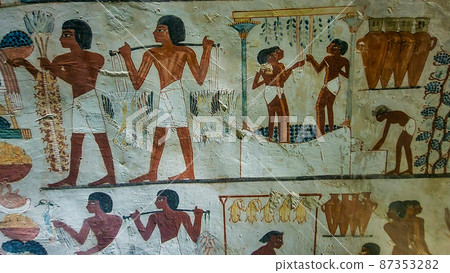 Luxor, Egypt: Corridor with ancient Egyptian inscriptions and hieroglyphs in a tomb. 87353282
