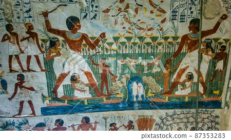 Luxor, Egypt: Corridor with ancient Egyptian inscriptions and hieroglyphs in a tomb. 87353283