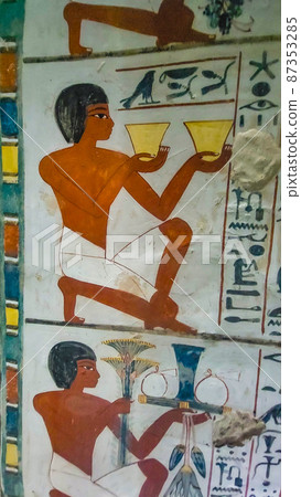 Luxor, Egypt: Corridor with ancient Egyptian inscriptions and hieroglyphs in a tomb. Luxor, Egypt: Corridor with ancient Egyptian inscriptions and hieroglyphs in a tomb. 87353285