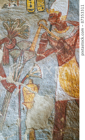 Luxor, Egypt: Corridor with ancient Egyptian inscriptions and hieroglyphs in a tomb. 87353311